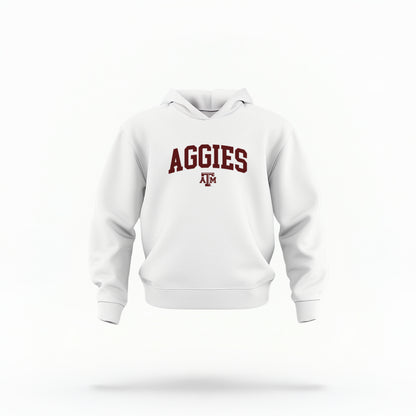 The White Toddler Unisex Texas A&M Aggies Collegiate Hooded Sweatshirt lays flat on a white background. The ﻿Texas A&M Aggies Collegiate﻿ graphic is in bold Maroon in a Varsity style.