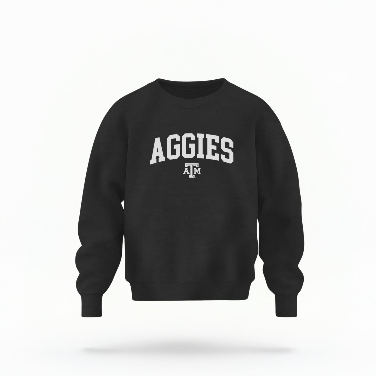 The Black Youth Unisex Texas A&M Aggies Collegiate Crewneck Sweatshirt lays flat on a white background. The ﻿Texas A&M Aggies Collegiate﻿ graphic is in bold White in a Varsity style.