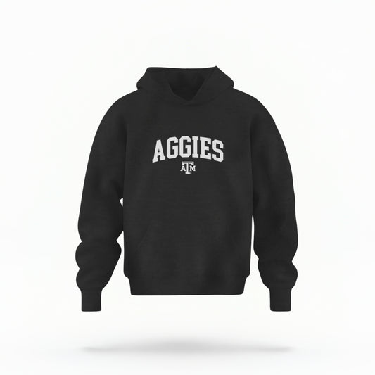 The Black Youth Unisex Texas A&M Aggies Collegiate Hooded Sweatshirt lays flat on a white background. The ﻿Texas A&M Aggies Collegiate﻿ graphic is in bold White in a Varsity style.