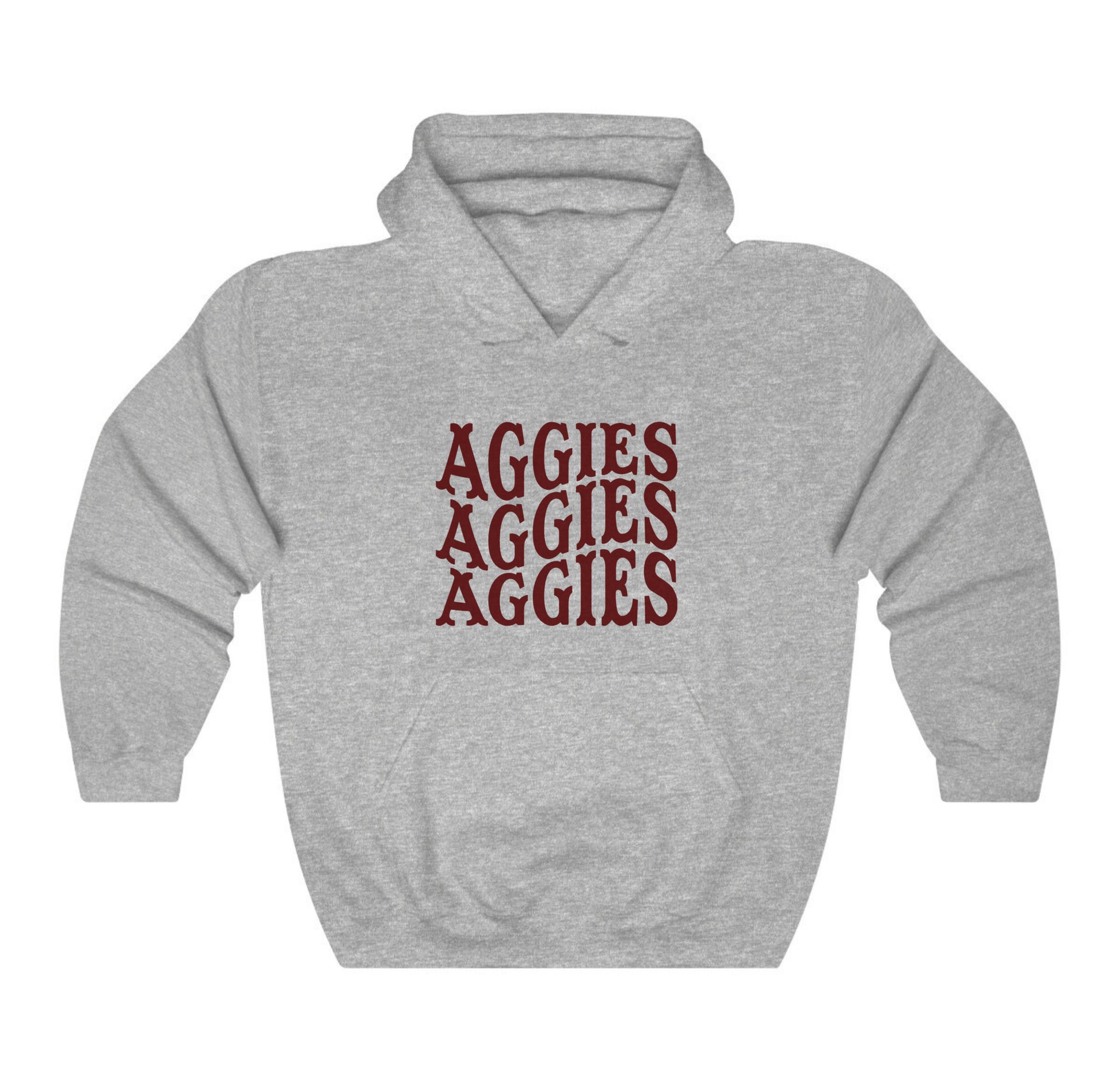 The Sport Grey Adult Unisex Texas A&M Aggies Aggies Aggies Western Hooded Sweatshirt lays flat on a white background. The ﻿Texas A&M Aggies Aggies Aggies Western﻿ graphic is in bold Maroon in a Western style.