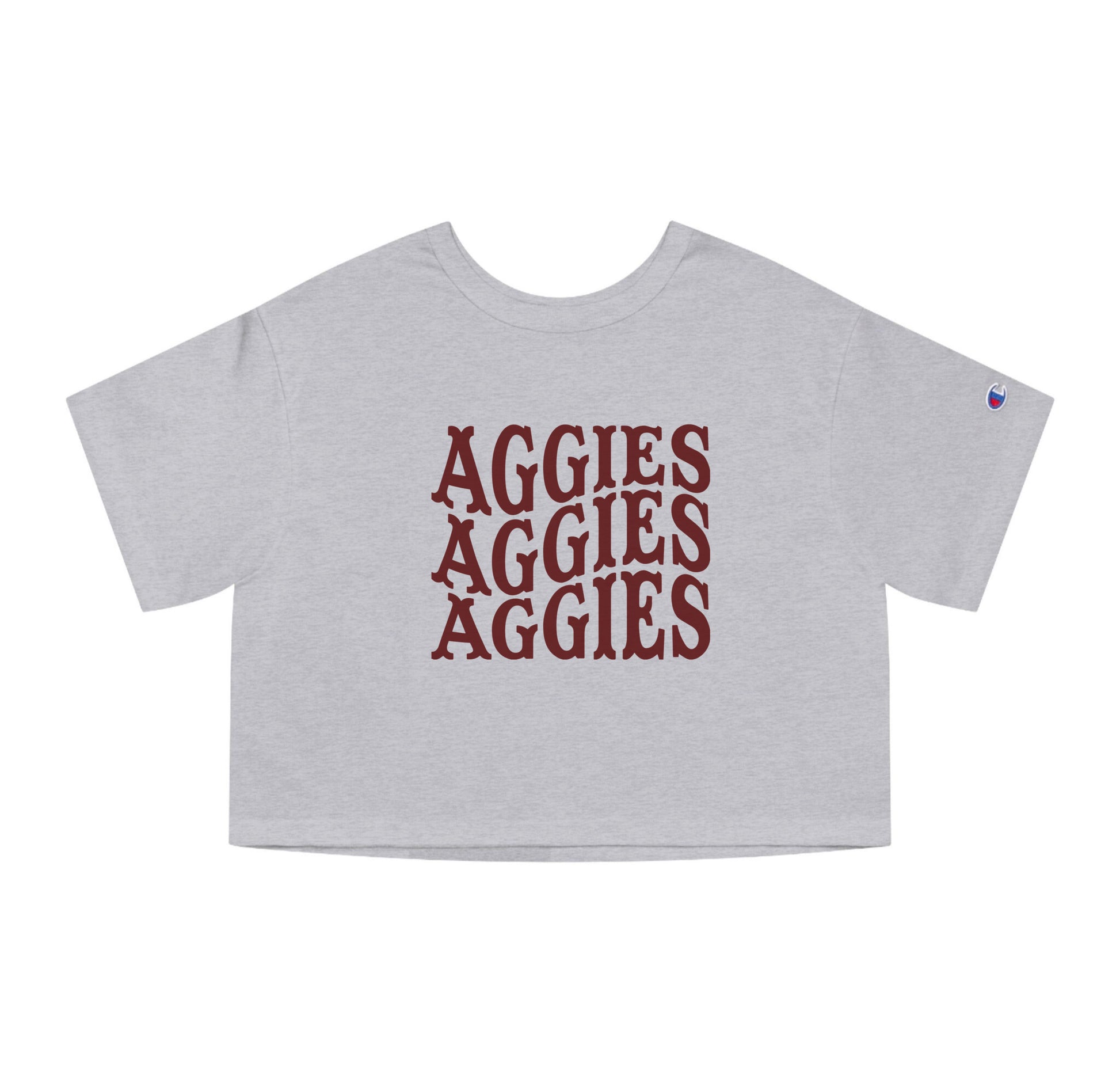 The Oxford Grey Adult Womens Texas A&M Aggies Aggies Aggies Western Crop Top lays flat on a white background. The ﻿Texas A&M Aggies Aggies Aggies Western﻿ graphic is in bold Maroon in a Western style.