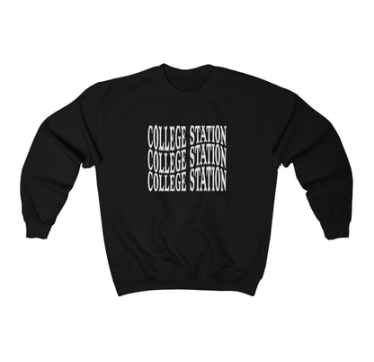 The Black Adult Unisex College Station Western Crewneck Sweatshirt lays flat on a white background. The ﻿College Station Western﻿ graphic is in bold White in a Western style.