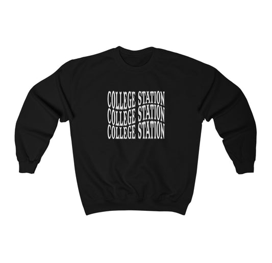 The Black Adult Unisex College Station Western Crewneck Sweatshirt lays flat on a white background. The ﻿College Station Western﻿ graphic is in bold White in a Western style.