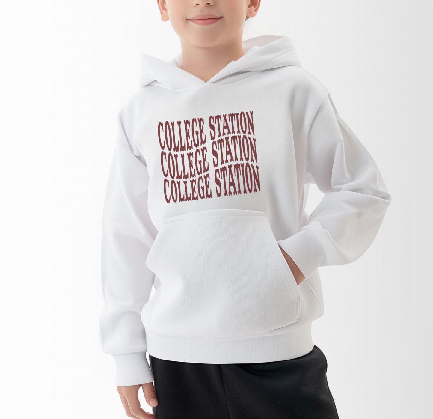 A model wears the White Youth Unisex College Station Western Hooded Sweatshirt.  The ﻿College Station Western﻿ graphic is in bold Maroon in a Western style.