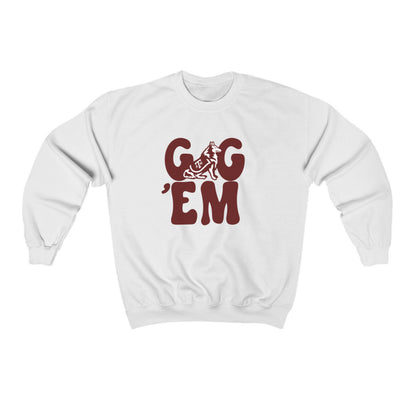 The White Adult Unisex Texas A&M Gig 'Em Retro Reveille Crewneck Sweatshirt lays flat on a white background. The ﻿Texas A&M Gig 'Em Retro Reveille﻿ graphic is in bold Maroon in a Groovy Vintage style.