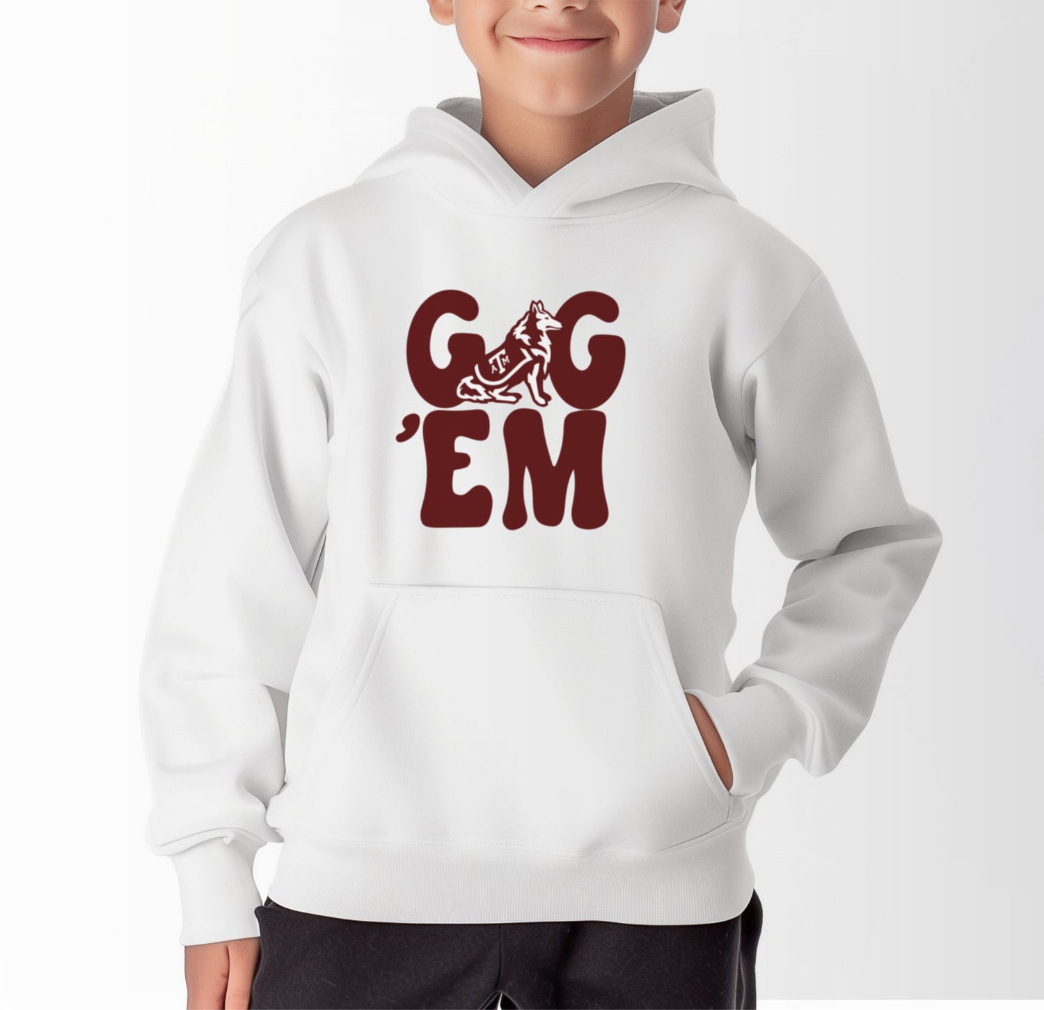 A model wears the White Youth Unisex Texas A&M Gig 'Em Retro Reveille Hooded Sweatshirt.  The ﻿Texas A&M Gig 'Em Retro Reveille﻿ graphic is in bold Maroon in a Groovy Vintage style.