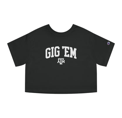 The Black Adult Womens Texas A&M Gig 'Em Collegiate Crop Top lays flat on a white background. The ﻿Texas A&M Gig 'Em Collegiate﻿ graphic is in bold White in a Collegiate style.