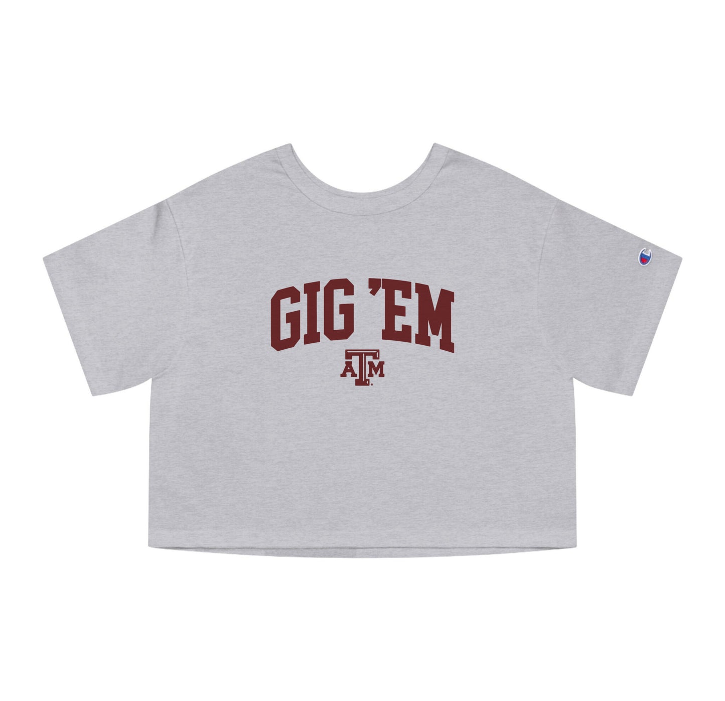 The Oxford Grey Adult Womens Texas A&M Gig 'Em Collegiate Crop Top lays flat on a white background. The ﻿Texas A&M Gig 'Em Collegiate﻿ graphic is in bold Maroon in a Collegiate style.