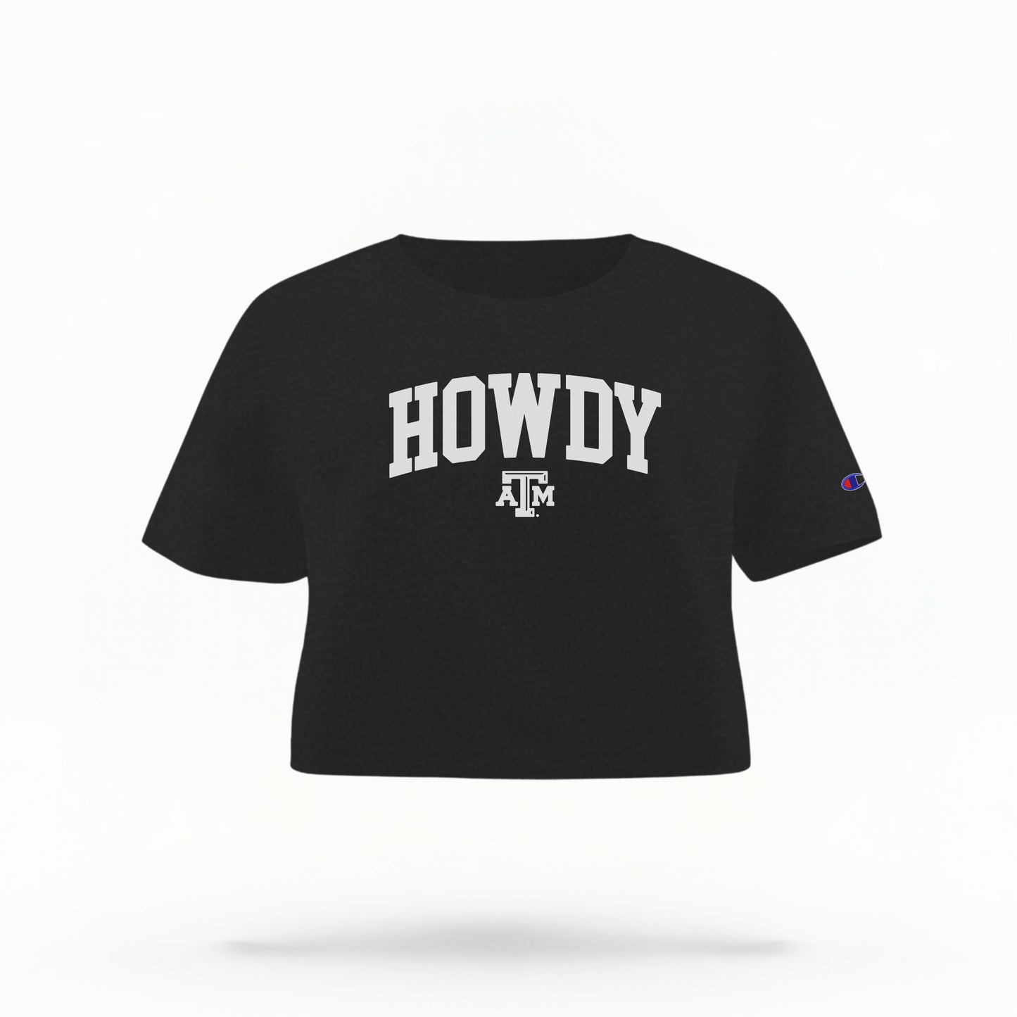 The Black Adult Womens Texas A&M Howdy Varsity Crop Top lays flat on a white background. The ﻿Texas A&M Howdy Varsity﻿ graphic is in bold White in a Collegiate style.