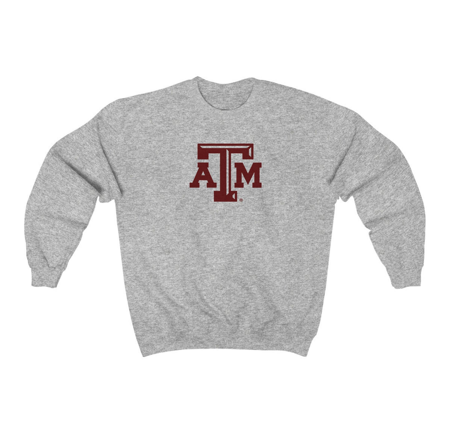 The Sport Grey Adult Unisex Texas A&M Logo Crewneck Sweatshirt lays flat on a white background. The ﻿Texas A&M Logo﻿ graphic is in bold Maroon in a Varsity style.