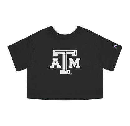 The Black Adult Womens Texas A&M Logo Crop Top lays flat on a white background. The ﻿Texas A&M Logo﻿ graphic is in bold White in a Varsity style.