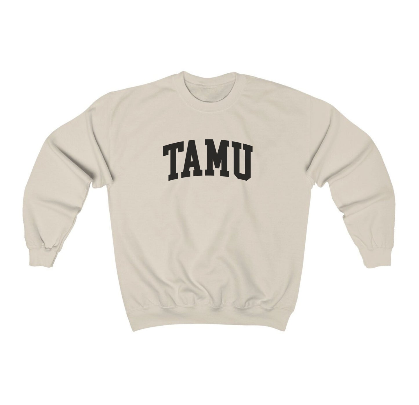 The Sand Adult Unisex Texas A&M TAMU Crewneck Sweatshirt lays flat on a white background. The ﻿Texas A&M TAMU﻿ graphic is in bold Black in a Collegiate style.