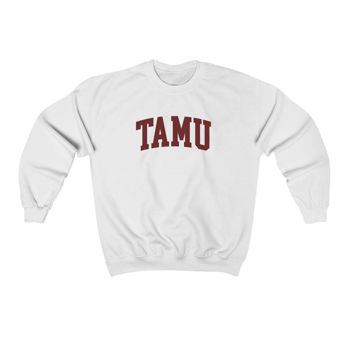 The White Adult Unisex Texas A&M TAMU Crewneck Sweatshirt lays flat on a white background. The ﻿Texas A&M TAMU﻿ graphic is in bold Maroon in a Collegiate style.