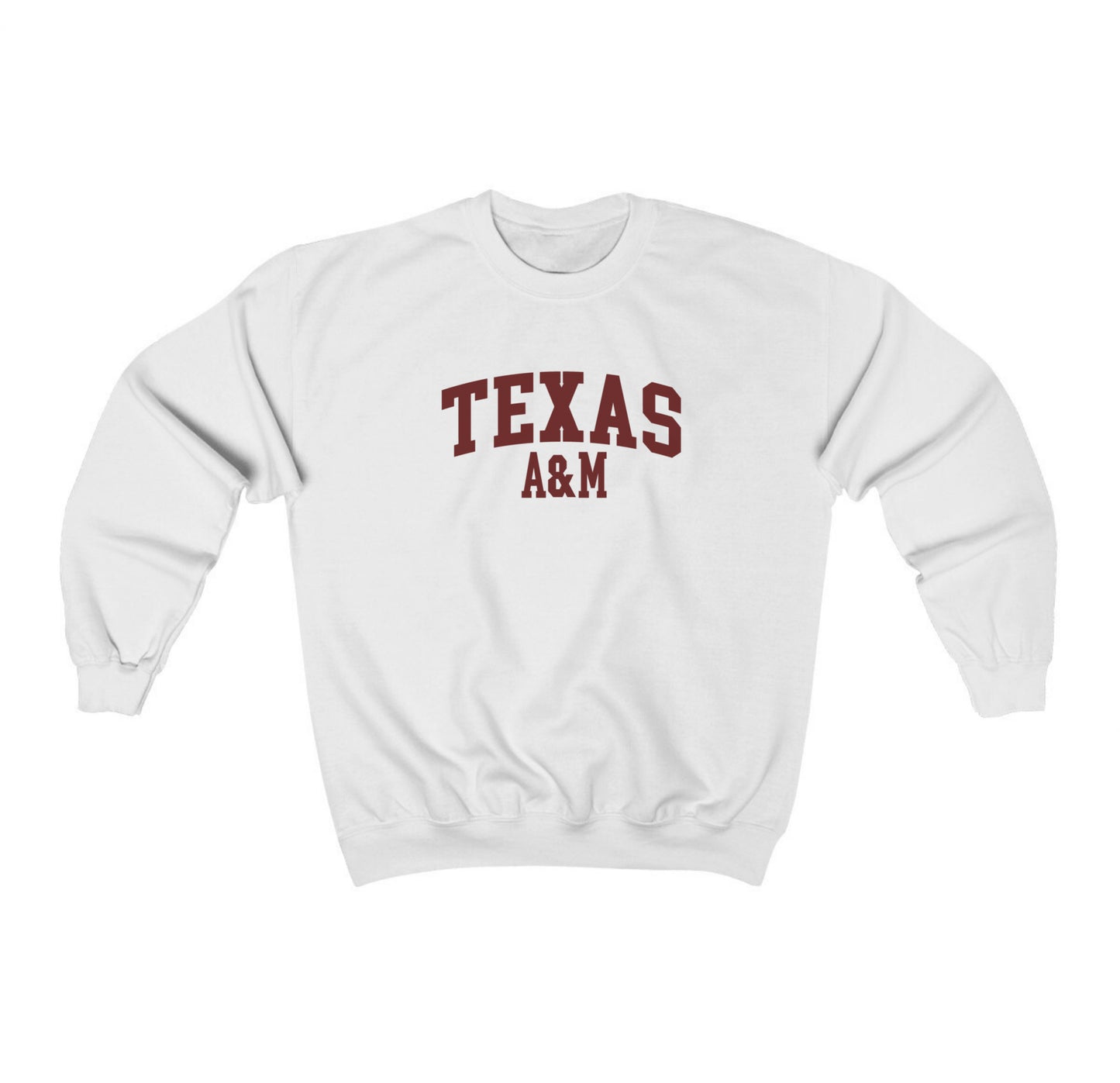 The White Adult Unisex Texas A&M Varsity Crewneck Sweatshirt lays flat on a white background. The ﻿Texas A&M Varsity﻿ graphic is in bold Maroon in a Collegiate style.