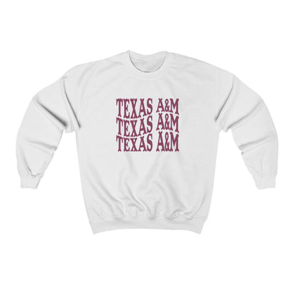 The White Adult Unisex Texas A&M Western Crewneck Sweatshirt lays flat on a white background. The ﻿Texas A&M Western﻿ graphic is in bold Maroon in a Western style.