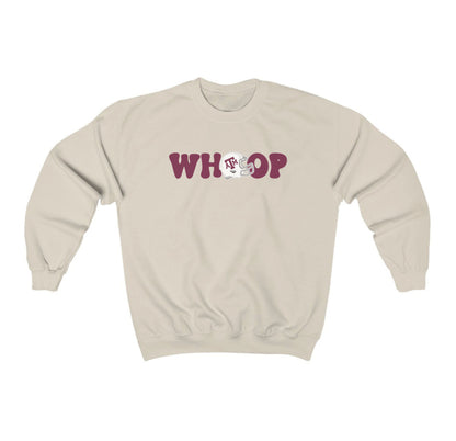 The Sand Adult Unisex Texas A&M Retro Whoop Crewneck Sweatshirt lays flat on a white background. The ﻿Texas A&M Retro Whoop﻿ graphic is in bold Black in a Vintage style.