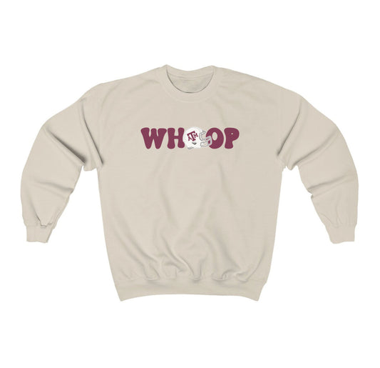 The Sand Adult Unisex Texas A&M Retro Whoop Crewneck Sweatshirt lays flat on a white background. The ﻿Texas A&M Retro Whoop﻿ graphic is in bold Black in a Vintage style.