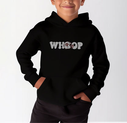 A model wears the Black Youth Unisex Texas A&M Retro Whoop Hooded Sweatshirt.  The ﻿Texas A&M Retro Whoop﻿ graphic is in bold White in a Vintage style.