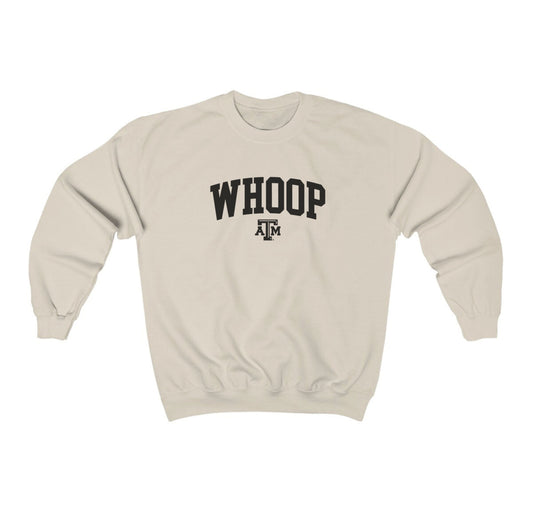 The Sand Adult Unisex Texas A&M Whoop Collegiate Crewneck Sweatshirt lays flat on a white background. The ﻿Texas A&M Whoop Collegiate﻿ graphic is in bold Black in a Varsity style.