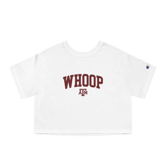 The White Adult Womens Texas A&M Whoop Collegiate Crop Top lays flat on a white background. The ﻿Texas A&M Whoop Collegiate﻿ graphic is in bold Maroon in a Varsity style.