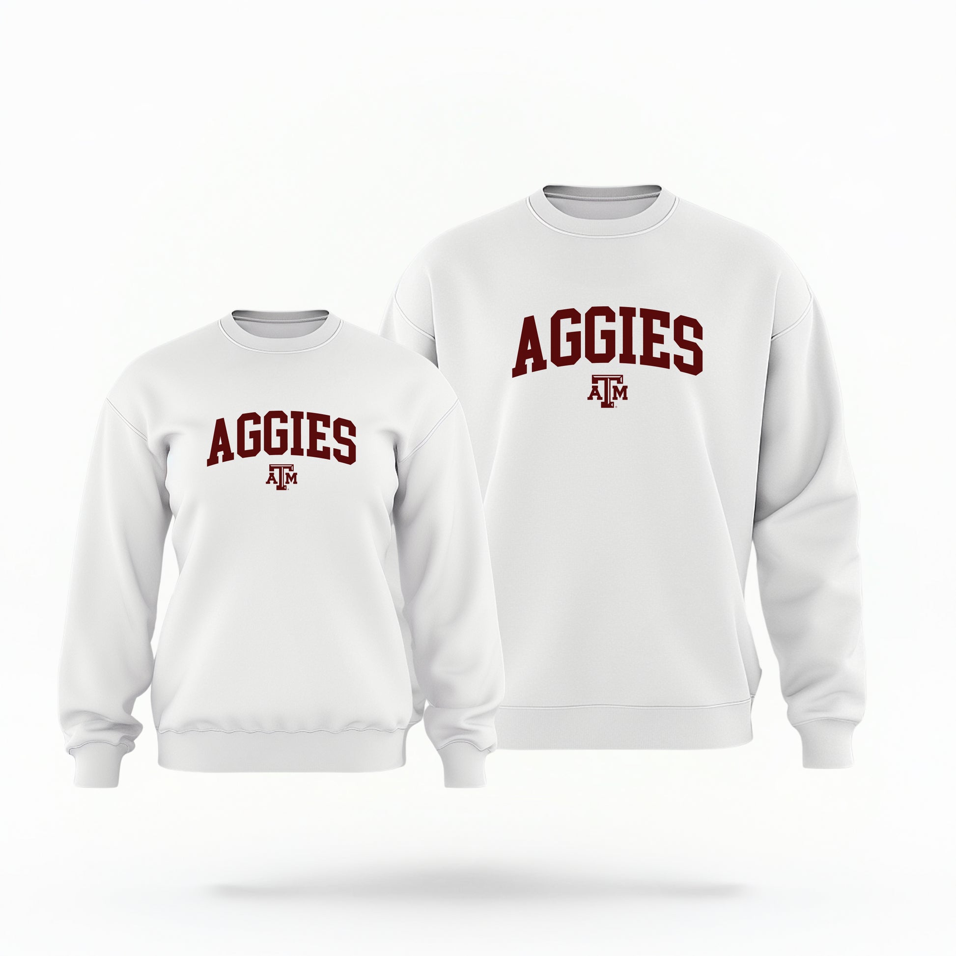 The White Adult Unisex Texas A&M Aggies Collegiate Crewneck Sweatshirt lays flat on a white background. The ﻿Texas A&M Aggies Collegiate﻿ graphic is in bold Maroon in a Collegiate style.