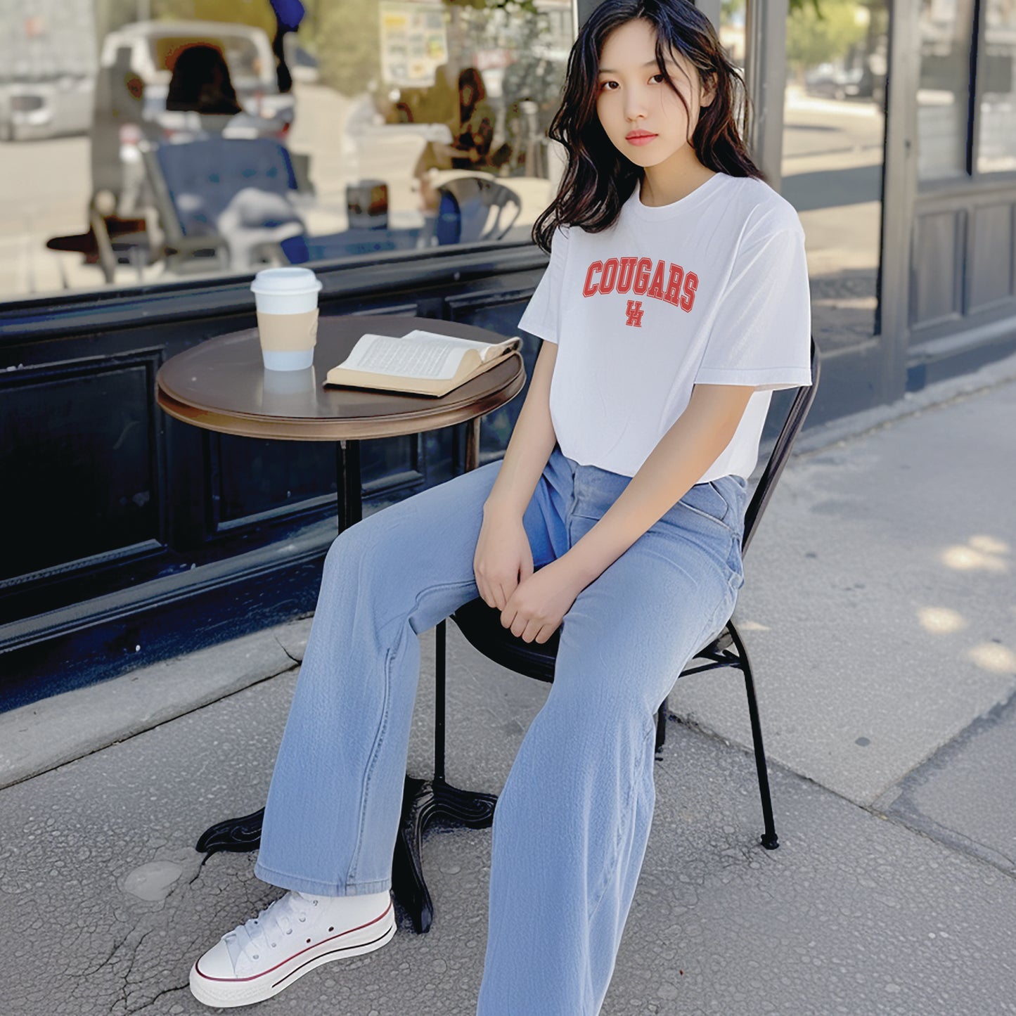 A model wears the Houston Cougars t-shirt. 