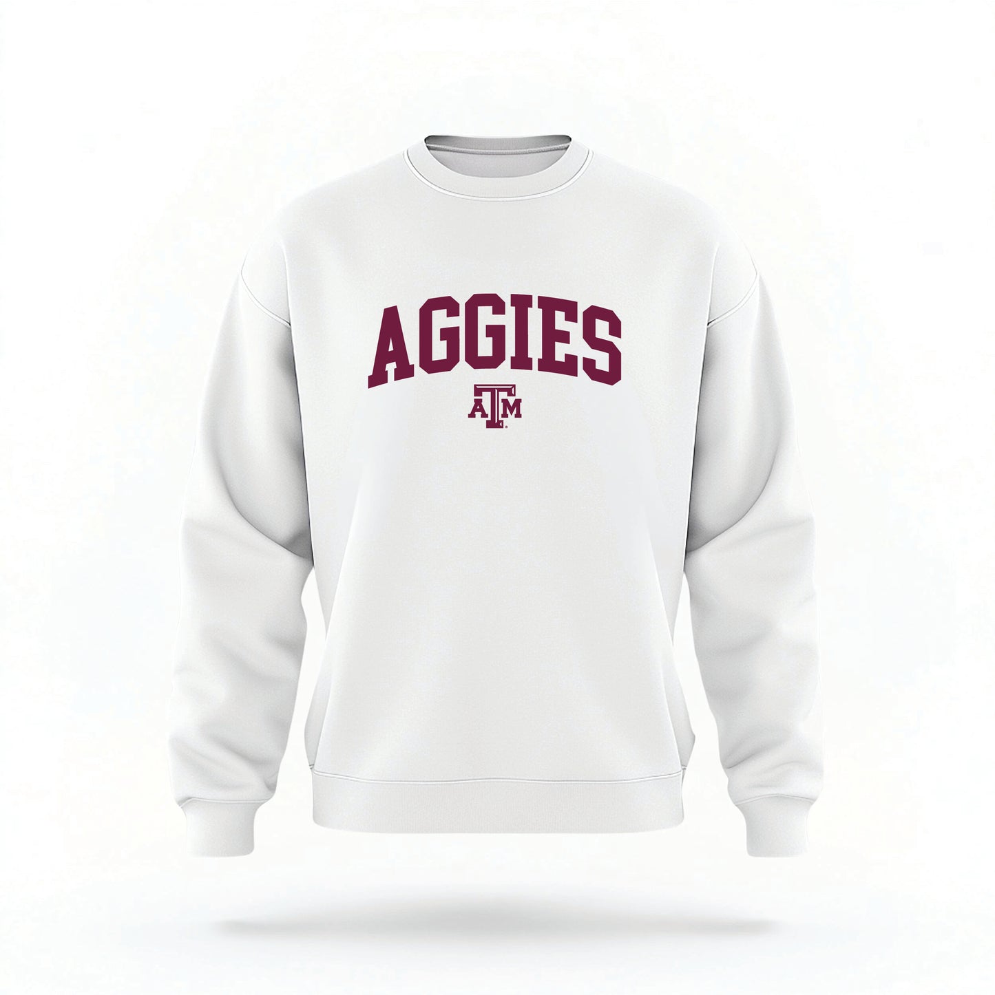 The White Unisex Texas A&M Aggies Collegiate Crewneck Sweatshirt lays flat on a white background. The ﻿Texas A&M Aggies Collegiate﻿ graphic is in bold Maroon in a Collegiate style.