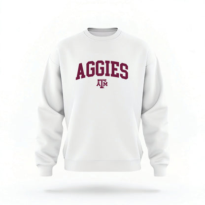 The White Unisex Texas A&M Aggies Collegiate Crewneck Sweatshirt lays flat on a white background. The ﻿Texas A&M Aggies Collegiate﻿ graphic is in bold Maroon in a Collegiate style.