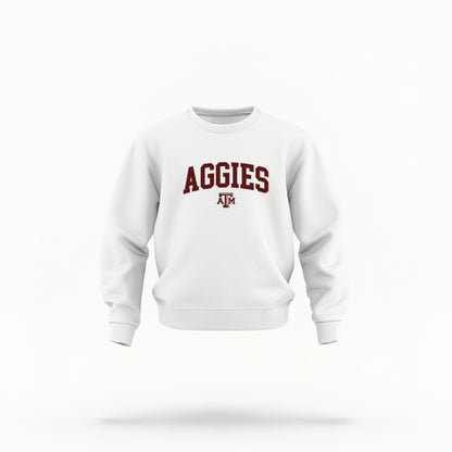 The White Texas A&M Aggies Collegiate Crewneck Sweatshirt lays flat on a white background. The ﻿Texas A&M Aggies Collegiate﻿ graphic is in bold Maroon in a Varsity style.