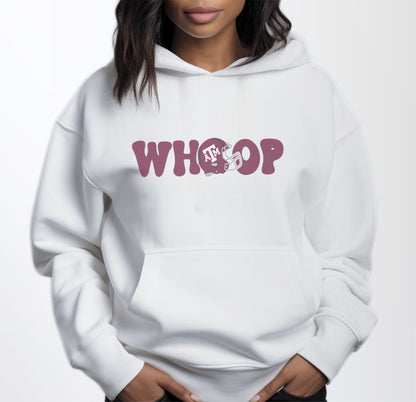 A model wears the White Adult Unisex Texas A&M Retro Whoop Hooded Sweatshirt.  The ﻿Texas A&M Retro Whoop﻿ graphic is in bold Maroon in a Vintage style.