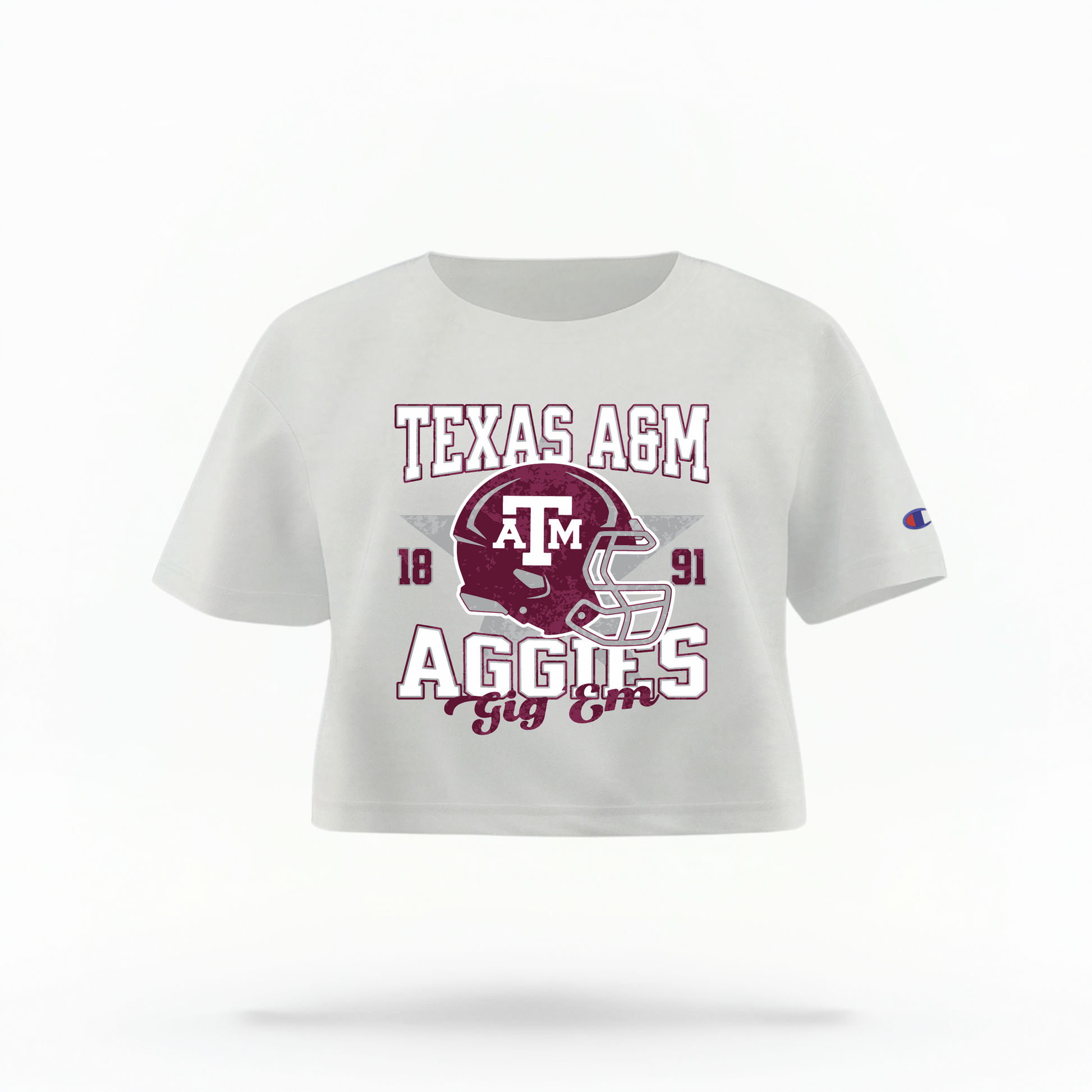 The White Texas A&M Aggies Football Crop Top lays flat on a white background. The ﻿Texas A&M Aggies Football﻿ graphic is in bold Multicolor in a Varsity style.