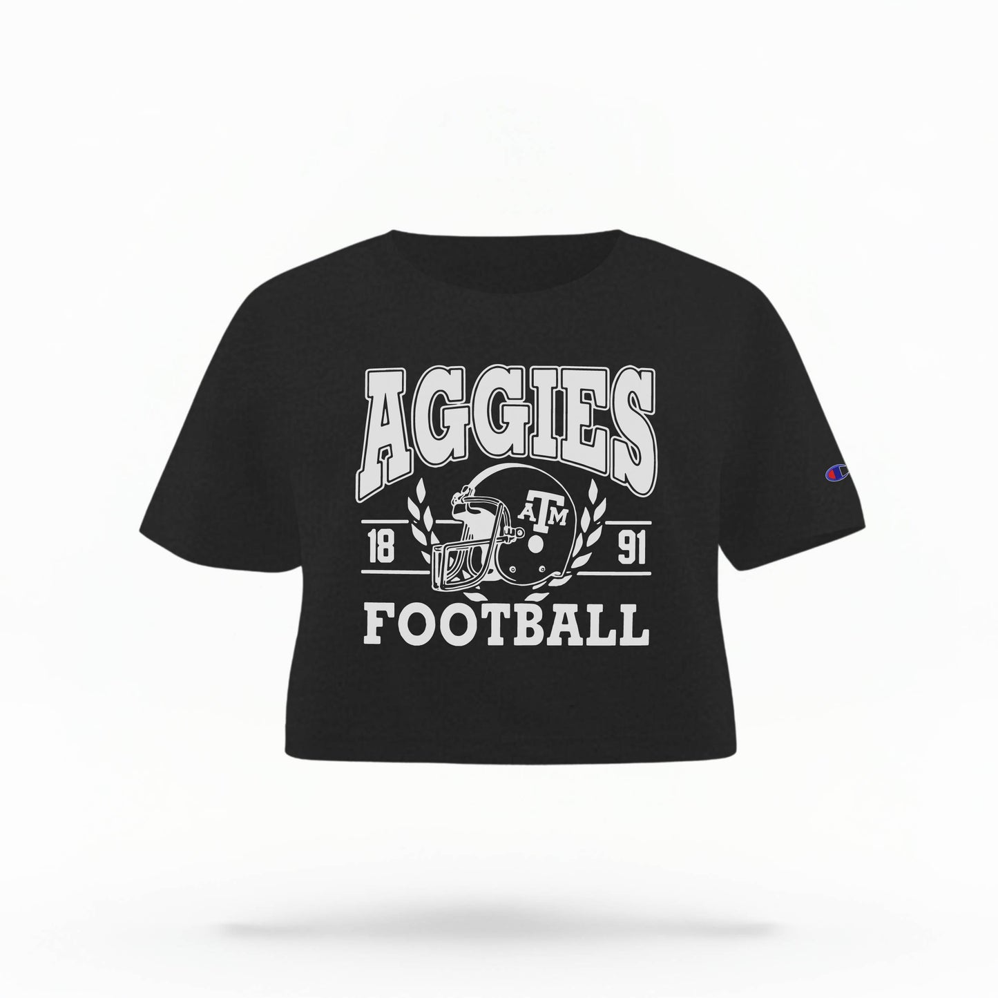 Texas A&M Aggies Women's Crop Top in black and white, featuring the "Aggies" logo and a football helmet graphic.